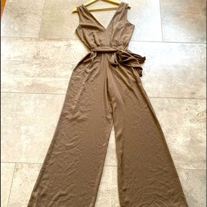 NWT- Beautiful BCBG Maxazria jumpsuit in Spanish moss size M. Originally $178